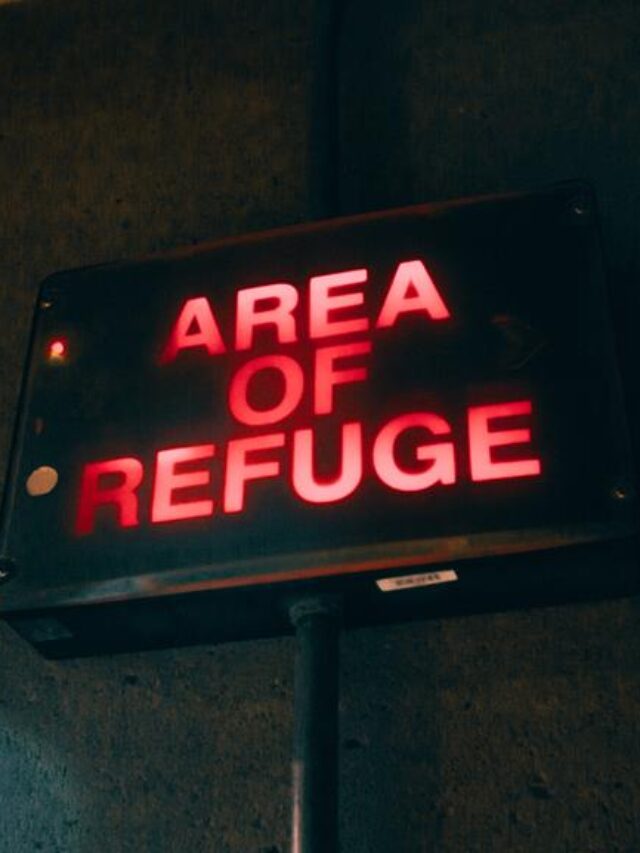 sign written "area of refuge" in red
