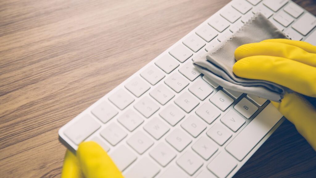 wiping down keyboard