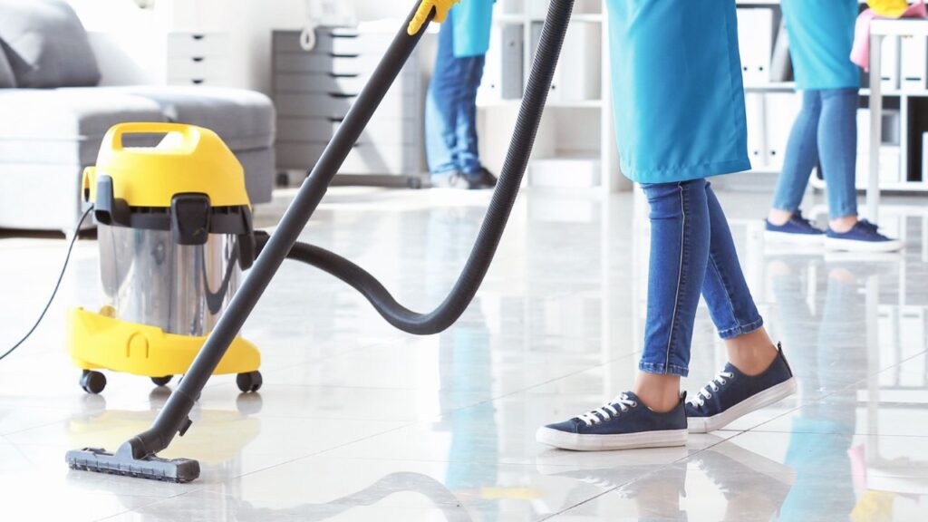 modern commercial vacuum cleaner being used in an office space