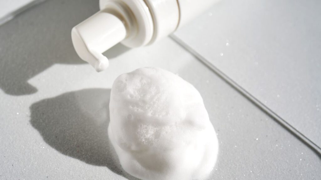 surfactant-on-tile-floor-with-bottle-to-the-side